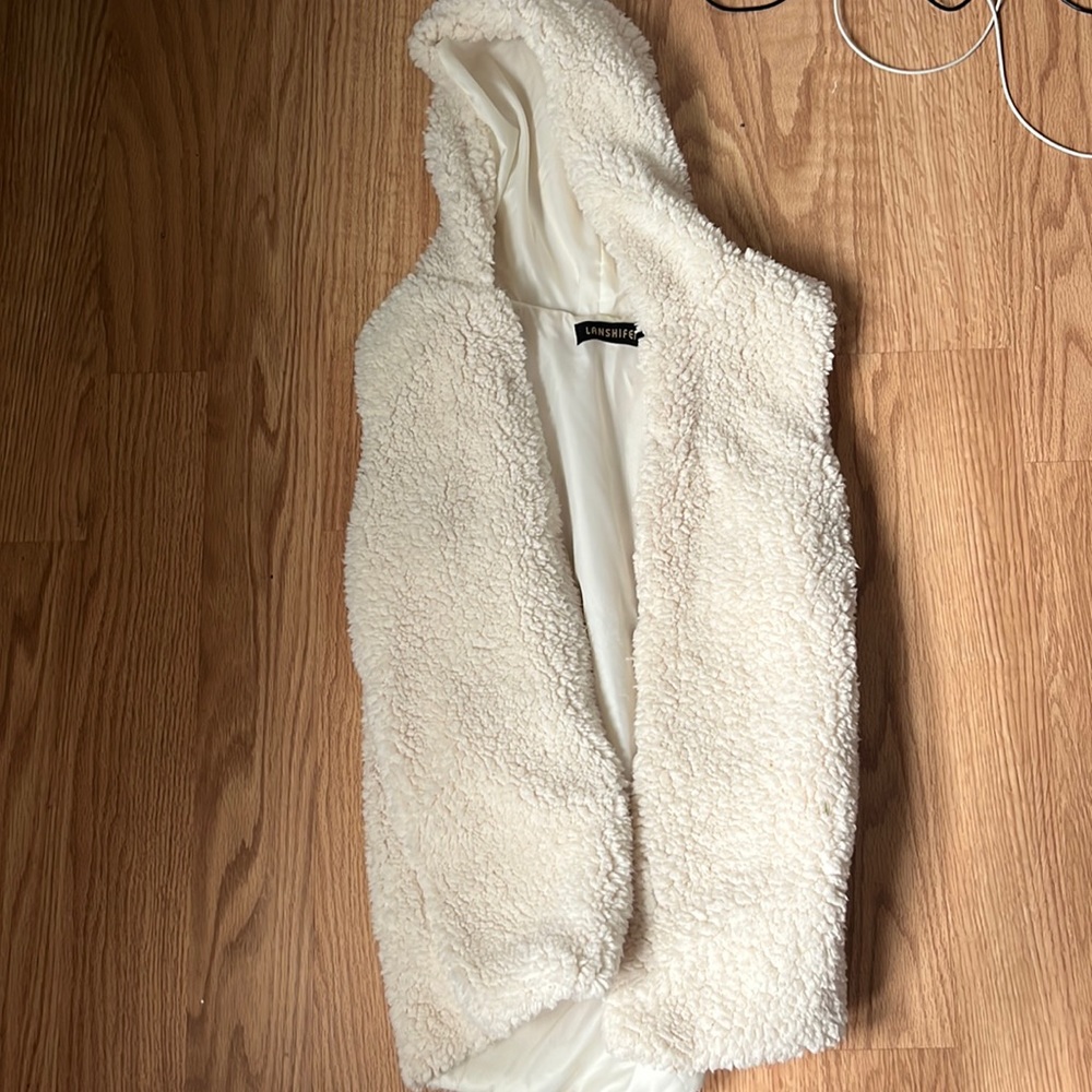 Fluffy vest with hood